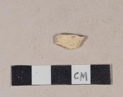 Tin glaze earthenware body sherd, missing all glaze