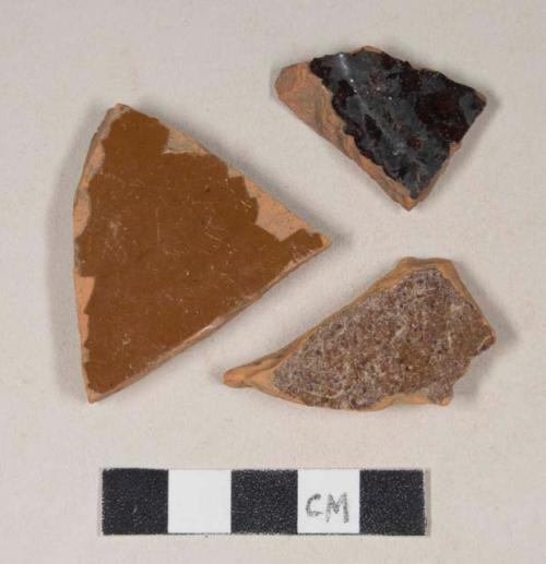 Undecorated, lead glazed redware base sherds