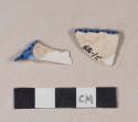 Molded, blue hand painted pearlware rim sherds; two sherds crossmend