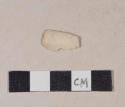 Unsmoked pipe bowl fragment with incised line around the rim