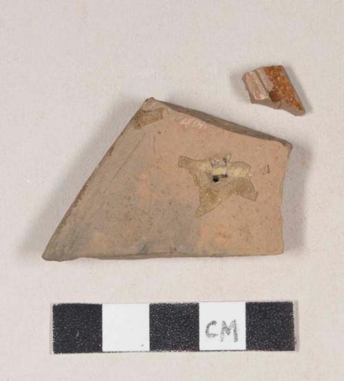 Slip decorated, lead glazed redware rim sherds