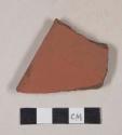 Redware tile fragment