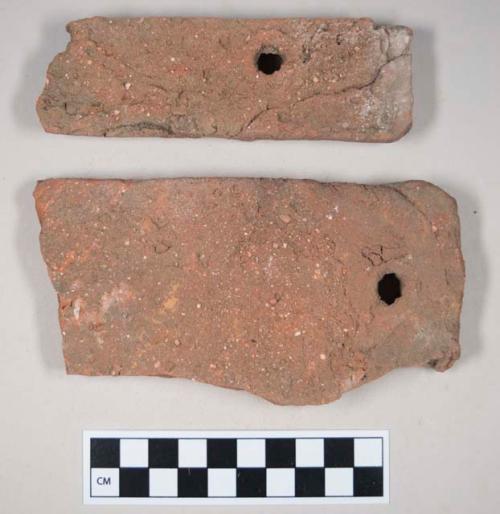 Redware roof tile fragments, with nail holes