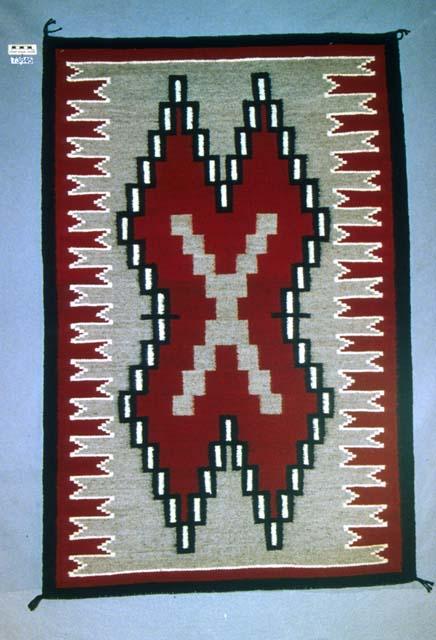 Klagetoh rug, "X" figure, fleched side borders