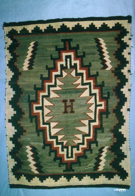 Early Klagetoh rug, concentric stepped diamond with "H" in center