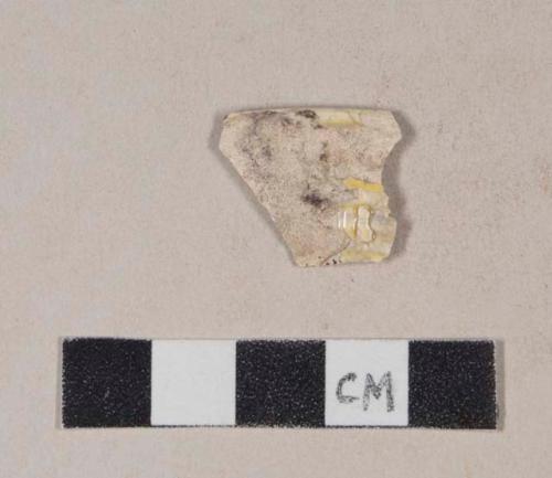 Molded creamware rim sherd