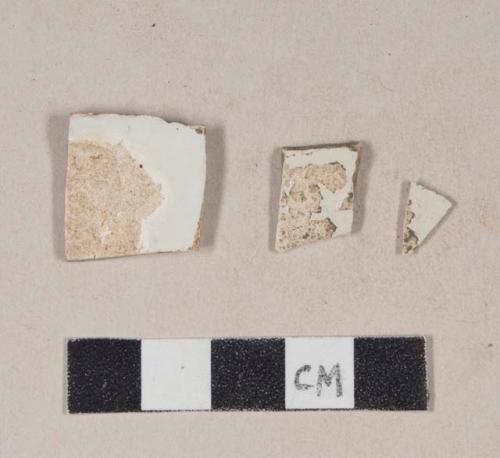 Undecorated pearlware body sherds; two sherds crossmend