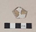 Undecorated ironstone rim sherd