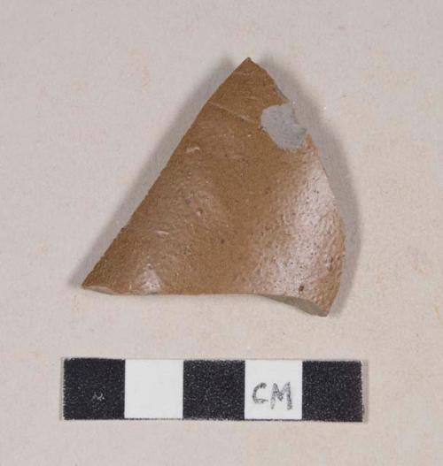 Gray bodied, brown slipped stoneware body sherd