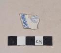 Blue transfer printed whiteware rim sherd