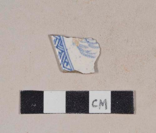 Blue transfer printed whiteware rim sherd