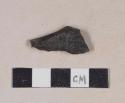 Burned, lead glazed redware body sherd