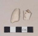 Smoked, undecorated pipe bowl fragments. Crossmend with pipe bowl/stem and bowl fragments 987-22-10/108749 and 987-22-10/108750