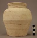 Small pottery urn - chalky white ware