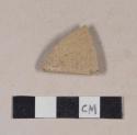 Buff bodied, buff glazed stoneware rim sherd