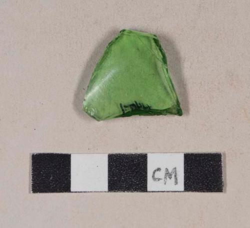 Green bottle glass fragment, with mold seam