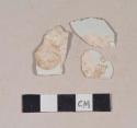 Undecorated pearlware body sherds; two crossmend with rim sherd 987-22-10/108779