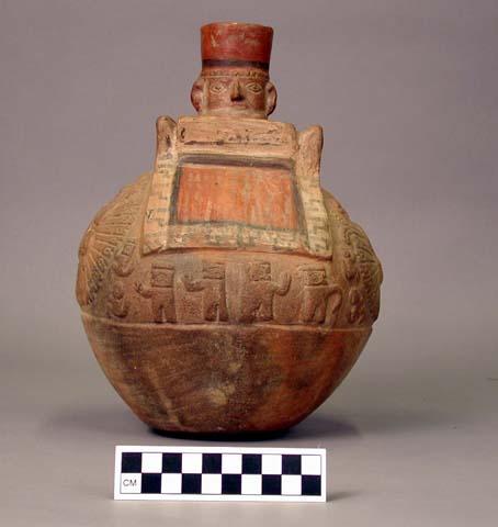 Middle Period Northern Coast red-ware: large jar, depicting house people-monkeys