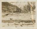 Snowy, rocky mountain valley