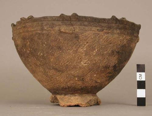 Ring-base pottery bowl - "Kamegaoka" type