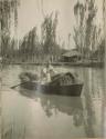 Paddling a full canoe along a canal