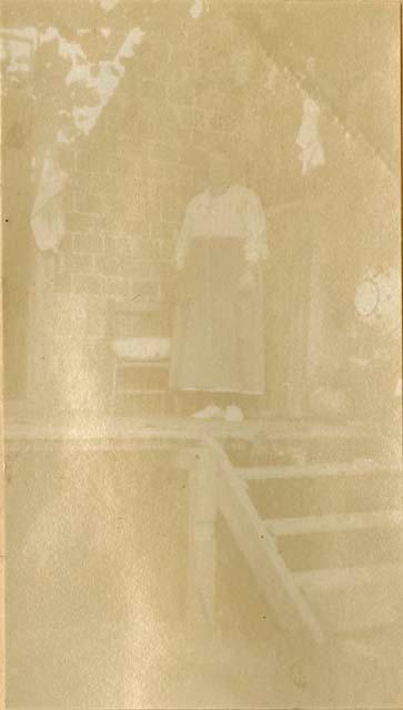 Woman standing on a porch