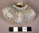 Blue and white potsherd from lid of toilet jar - geometric design