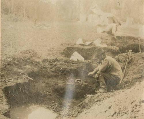 Excavating an archaeological trench