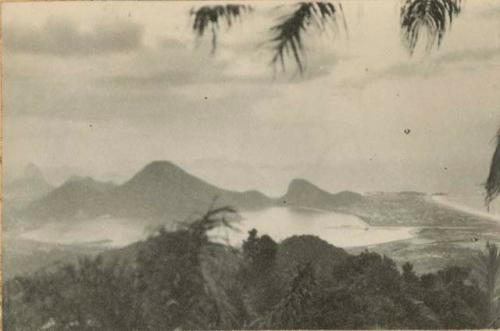 View of valley and shoreline from mountain or hill