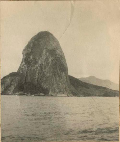 Steep rock rising from the ocean