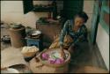 Preparing kue for temple offerings