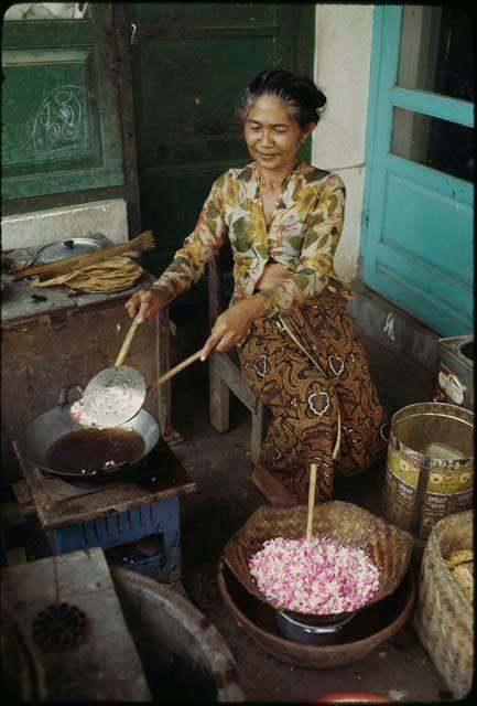 Preparing kue for temple offerings