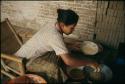 Preparing kue for temple offerings