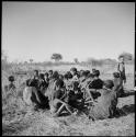 Large group of women and children sitting