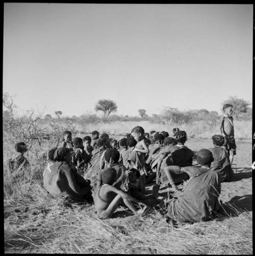 Large group of women and children sitting