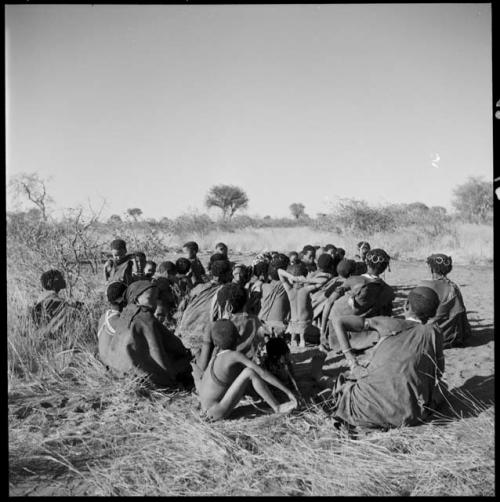 Large group of women and children sitting