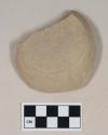 Red bodied earthenware base sherd, with green slip