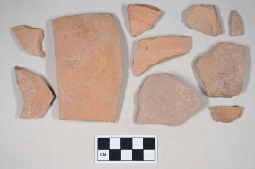 Red bodied earthenware body sherds, unslipped; two sherds crossmend