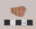 Red bodied earthenware body sherd, with brown slipped stripes, wheel thrown