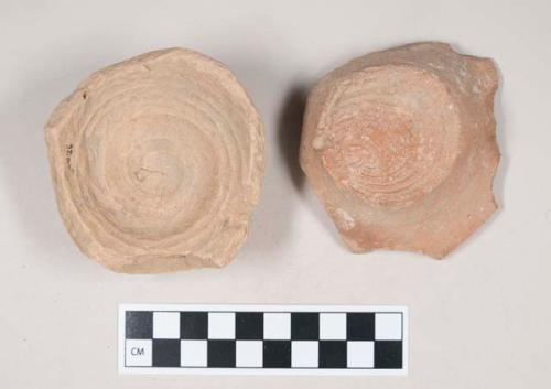 Coarse red bodied earthenware base sherds, unslipped