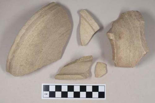 Buff bodied earthenware rim sherds, with buff slip