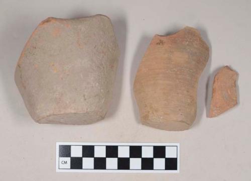 Red bodied earthenware base sherds, unslipped, wheel thrown