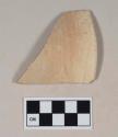 Buff bodied earthenware rim sherd, with buff slip, wheel thrown