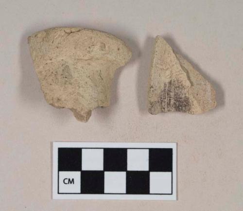 Coarse buff bodied earthenware rim sherds, with buff slip