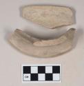 Coarse red bodied earthenware rim sherds, with buff slip, reduced core
