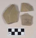 Green bodied earthenware base sherds, unslipped, wheel thrown