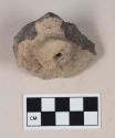 Coarse gray bodied earthenware object fragment, with red slip, possible wheel fragment