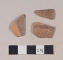 Red bodied earthenware rim sherds, with brown slip, wheel thrown; three sherds crossmend with 39-18-60/22039
