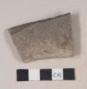Gray bodied earthenware body sherd, with gray slip, wheel thrown