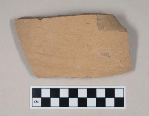 Coarse red bodied earthenware body sherd, unslipped